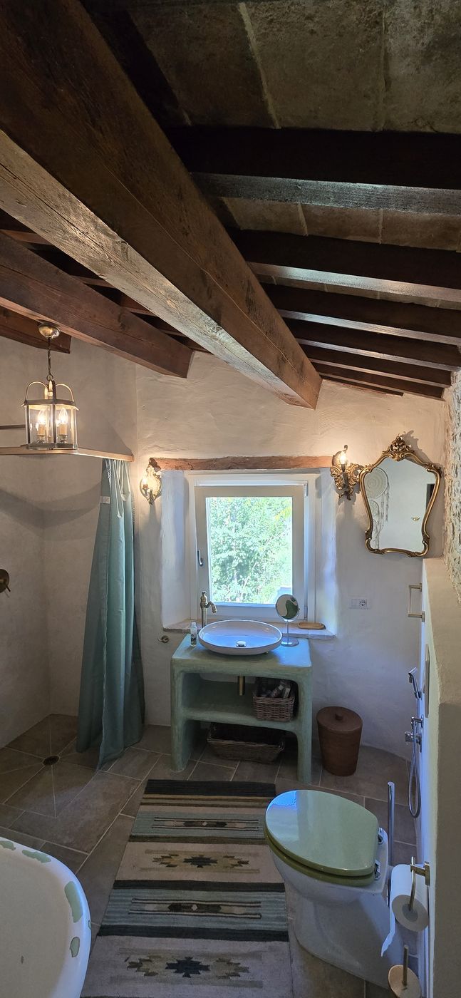 The private bathroom of The Arch — walk-in shower
