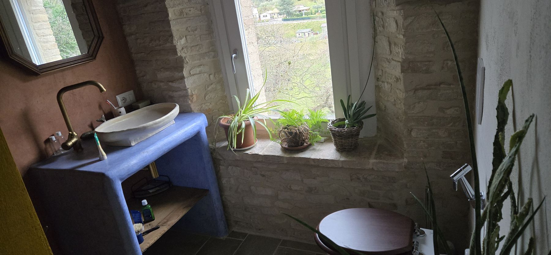 The shared bathroom of The Dog Paw and The View — washbasin