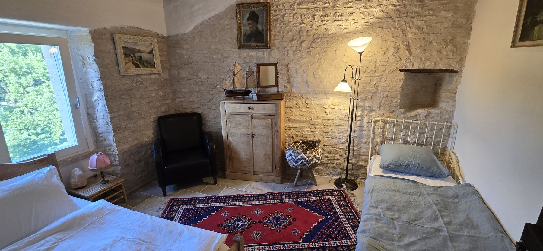 The Dog Paw — bedroom with two single beds under the historic tiled ceiling